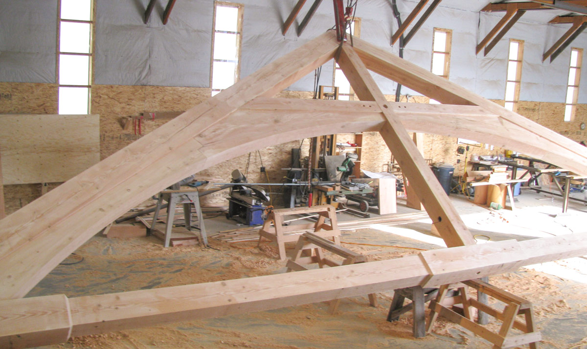 arched truss timber frame building