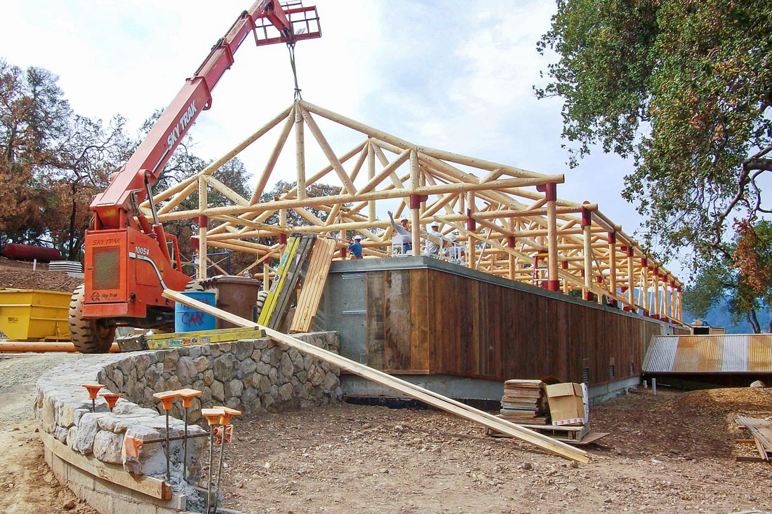 setting log trusses at a winery