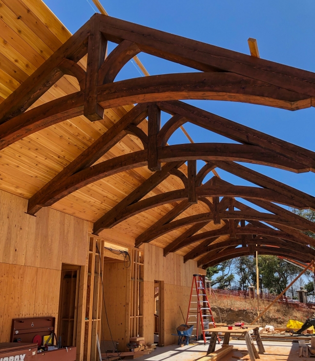 curved truss with tongue in groove ceiling applied